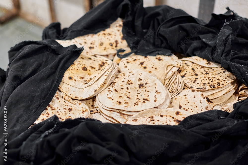 Batch Of Chapati Round Flatbreads In Black Bag For Langar In Sikh 