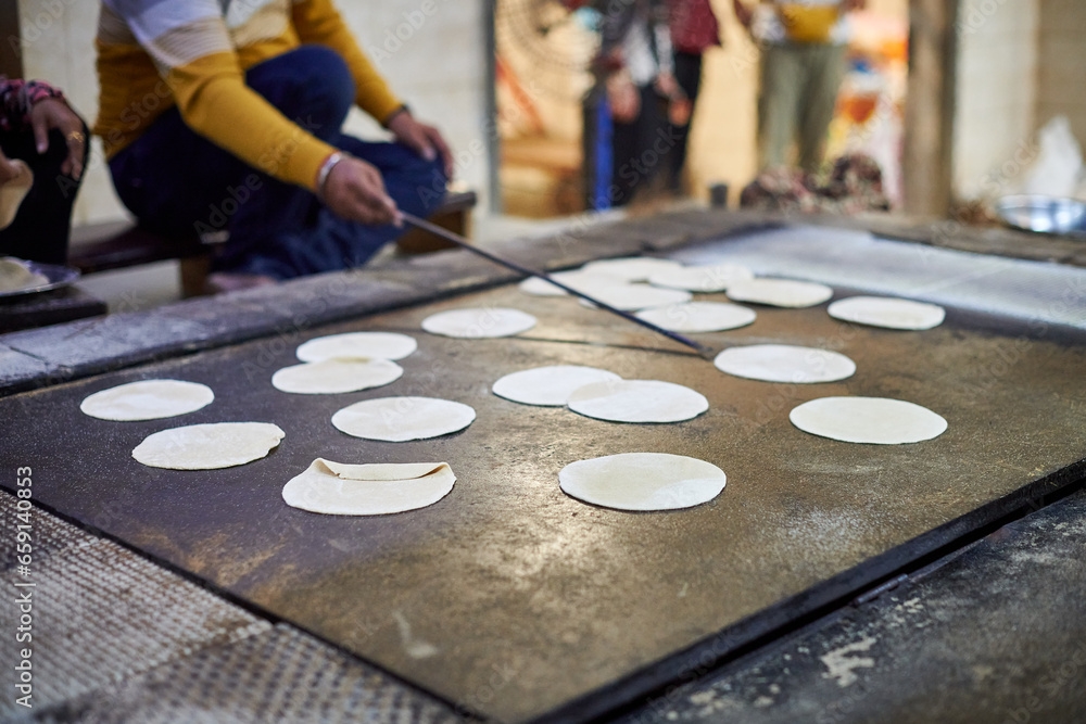 Making Of Chapati Round Flatbreads For Langar In Sikh Gurudwara Temple 